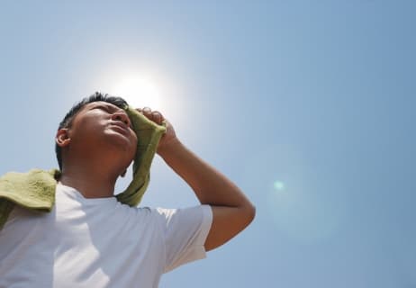 Woman with heat Illness