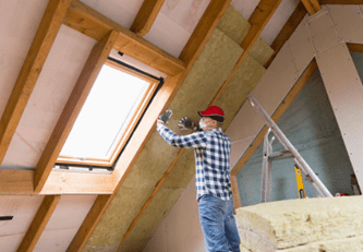 Man working in asn attic